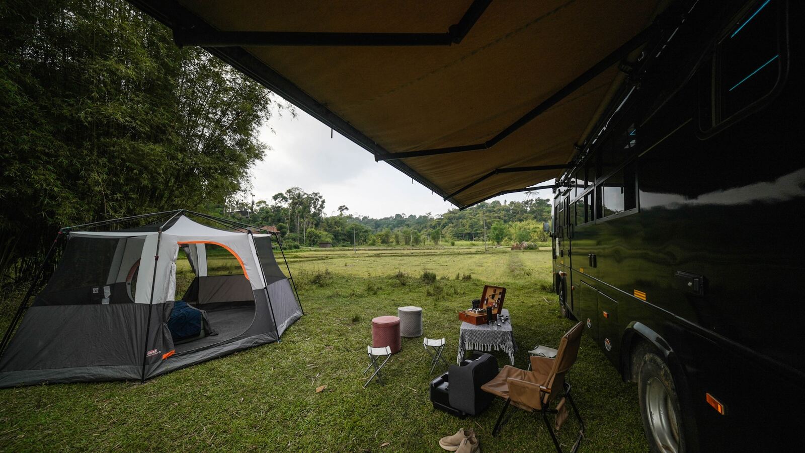 Black Caravan with awning extended
