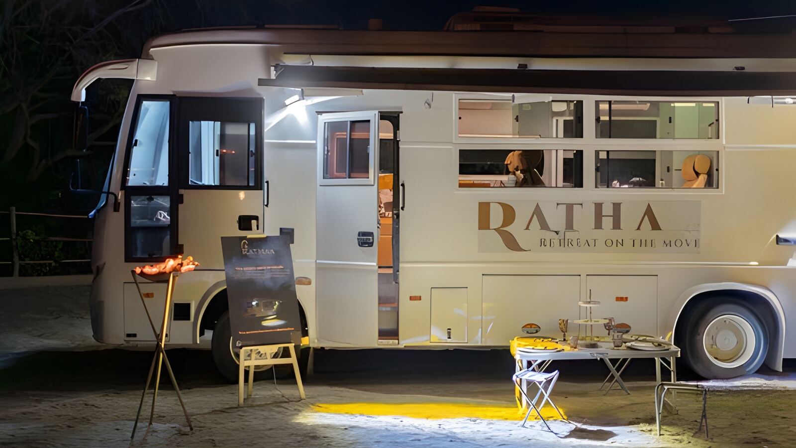 Couple enjoying an evening setup beside the caravan