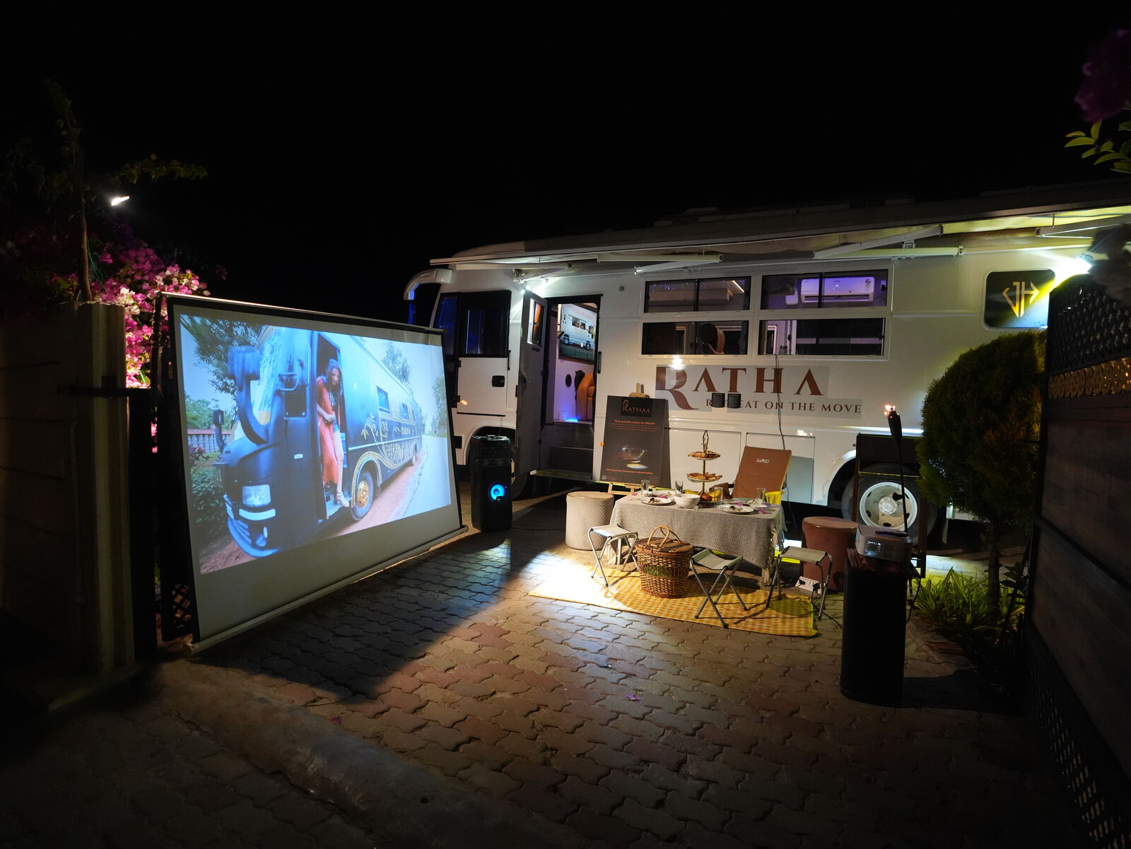 Outdoor cinema setup — caravan trip from Bangalore with private entertainment